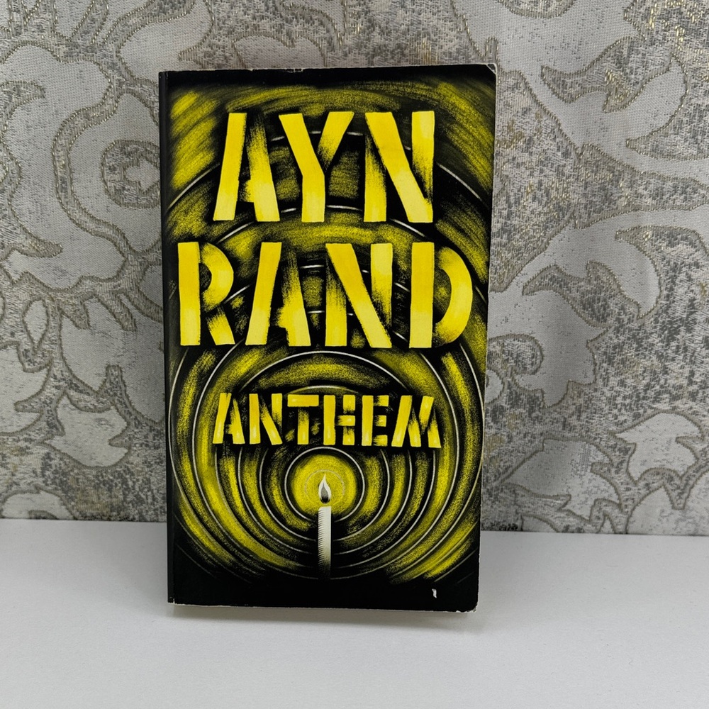 Ayn Rand 'Anthem' Book with Yellow and Black Cover